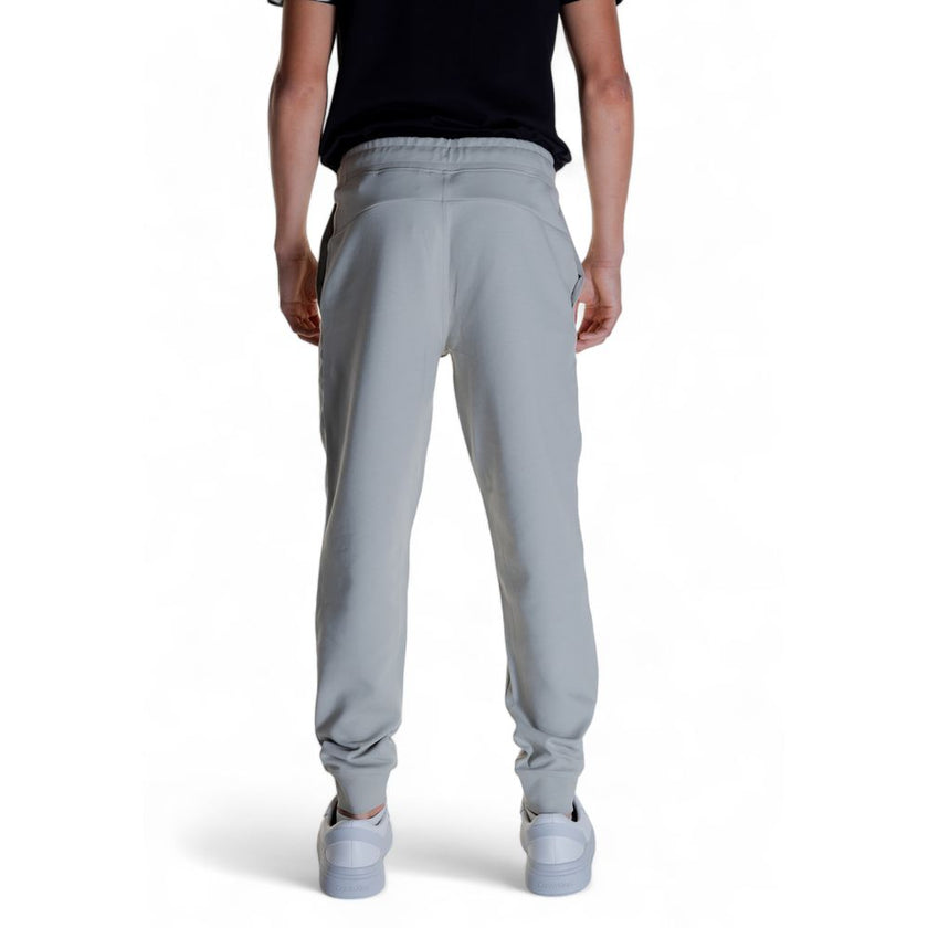 Gray Cotton Joggers (Workout Pants)Discover the Calvin Klein SHADOW EMBOSSED LOGO K10K113097 men’s sports pants, crafted from high-quality materials: 80% cotton, 16% recycled polyester, and 4% elastane/lycra. These pants provide exceptional comfort and a