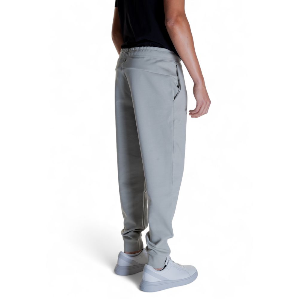 Gray Cotton Joggers (Workout Pants)Discover the Calvin Klein SHADOW EMBOSSED LOGO K10K113097 men’s sports pants, crafted from high-quality materials: 80% cotton, 16% recycled polyester, and 4% elastane/lycra. These pants provide exceptional comfort and a