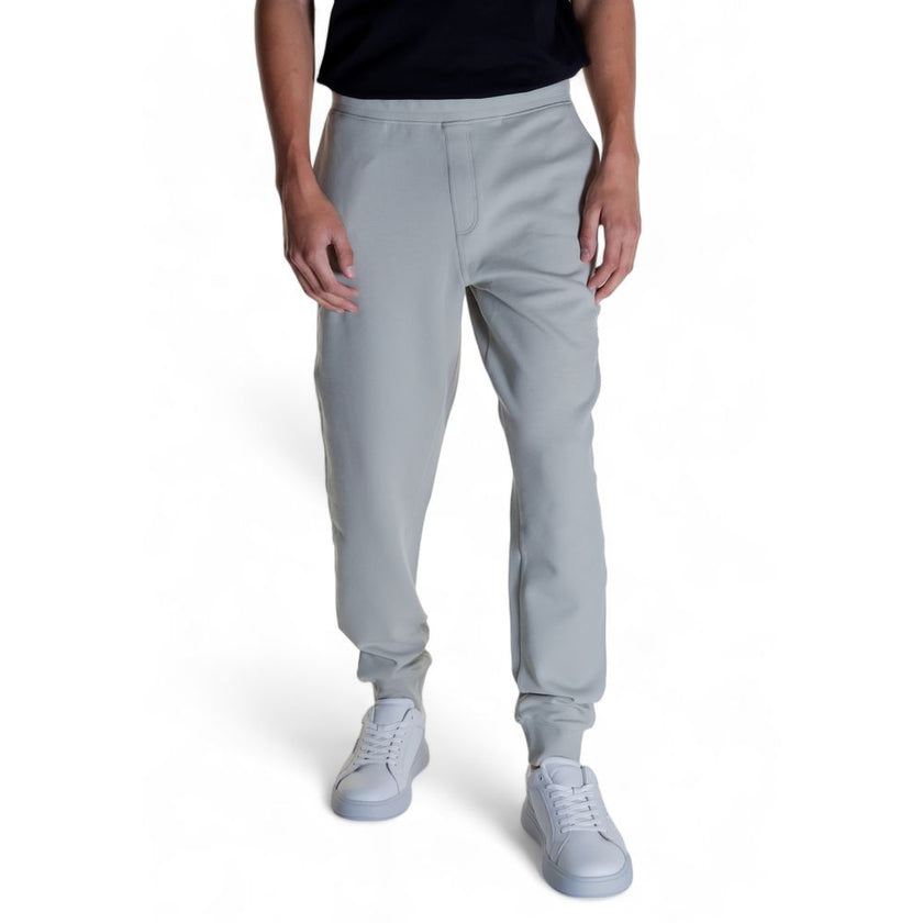Gray Cotton Joggers (Workout Pants)Discover the Calvin Klein SHADOW EMBOSSED LOGO K10K113097 men’s sports pants, crafted from high-quality materials: 80% cotton, 16% recycled polyester, and 4% elastane/lycra. These pants provide exceptional comfort and a