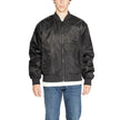 Black Polyamide Jackets & CoatThe Calvin Klein Jeans LS NYLON PADDED HERO 00040EM524 men’s jacket perfectly combines urban style and practicality. Made entirely from 100% polyamide, this padded jacket provides excellent protection against wind and cold, t