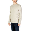 Beige Organic Cotton SweaterThe Calvin Klein Jeans CK INTARSIA MIX J30J326453 men’s sweater combines elegance and comfort in a timeless design. Crafted from a premium blend of 55% organic cotton, 35% cotton, and 10% wool, this sweater ensures a soft feel