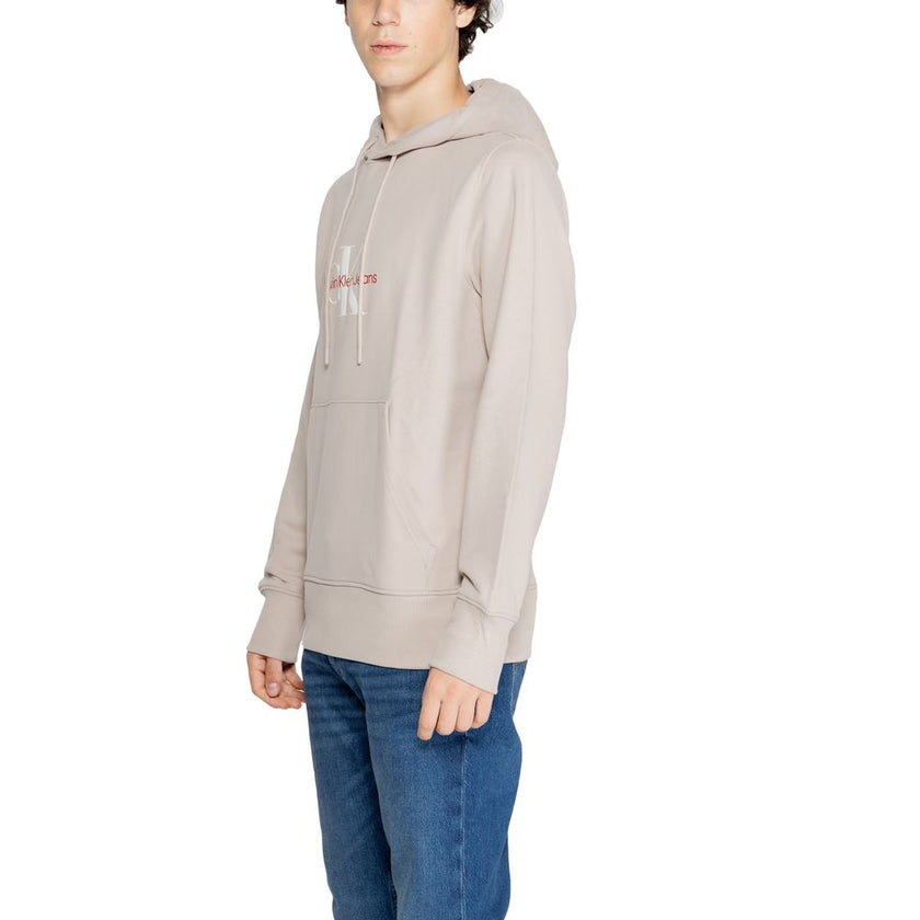 Beige Recycled Cotton HoodieDiscover the Calvin Klein Jeans DISTRESSED MONOLOGO J30J326875 hoodie for men, made from 100% recycled cotton for exceptional comfort and a perfect fit. This piece features a modern and casual design, making it ideal for your e