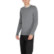 Gray Recycled Wool SportswearThe Calvin Klein MERINO RWS CREW NECK K10K109474 sweater is a must-have for the modern man’s wardrobe. Made from 100% RWS-certified recycled wool, this knitwear offers comfort, softness, and a focus on sustainability. The clas