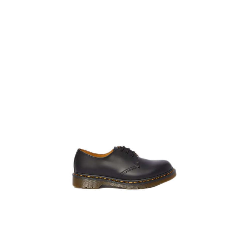 Black Leather Platform PumpsThe Dr. Martens CLASSIC SMOOTH 1461 11838002 low shoes for women are a symbol of style and comfort. Made from high-quality leather, these shoes offer exceptional durability and a perfect fit. The classic and timeless design mak