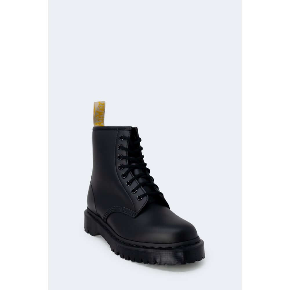 Black Polyester Lace-Up BootsDiscover the Dr. Martens VEGAN 1460 BEX MONO women’s boots, an icon of style and comfort. Made from 100% polyester, these boots are designed to provide a comfortable fit and lasting durability. Featuring a sturdy sole and clas