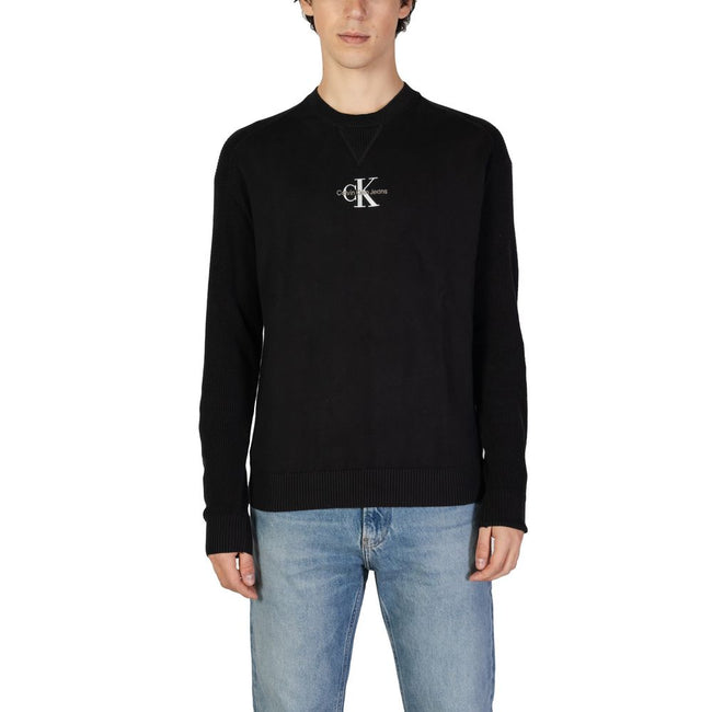 Black Cotton SweaterThe Calvin Klein Jeans MONOLOGO J30J325671 men’s sweater offers a contemporary and refined style, perfect for any casual or informal occasion. Made from 100% transitional in-conversion cotton, this garment ensures comfort, breathabilit