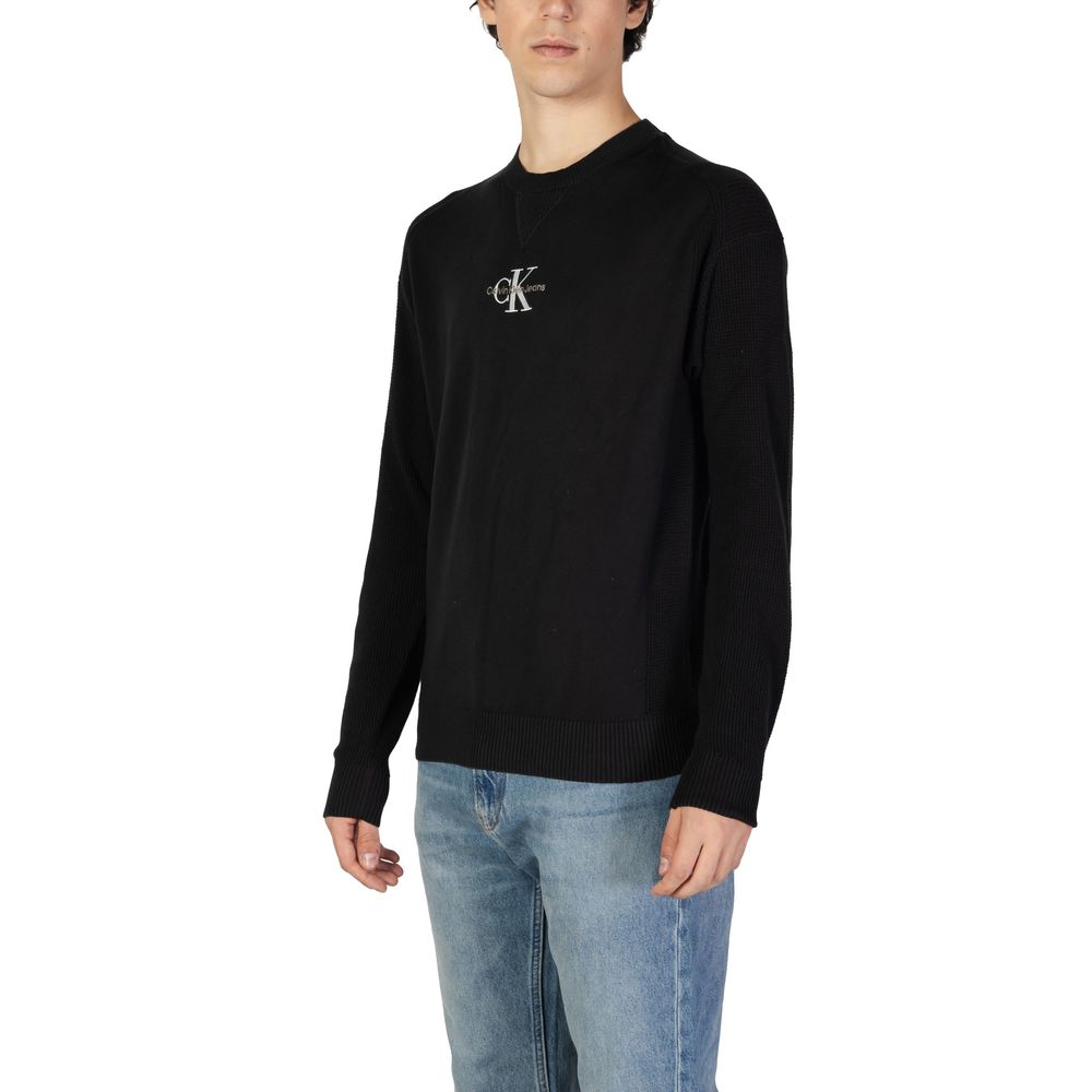 Black Cotton SweaterThe Calvin Klein Jeans MONOLOGO J30J325671 men’s sweater offers a contemporary and refined style, perfect for any casual or informal occasion. Made from 100% transitional in-conversion cotton, this garment ensures comfort, breathabilit