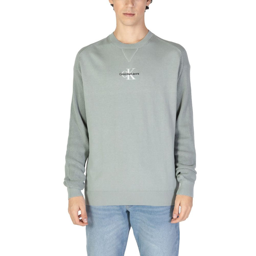 Green Cotton SweaterThe Calvin Klein Jeans MONOLOGO J30J325671 men’s sweater offers a contemporary and refined style, perfect for any casual or informal occasion. Made from 100% transitional in-conversion cotton, this garment ensures comfort, breathabilit