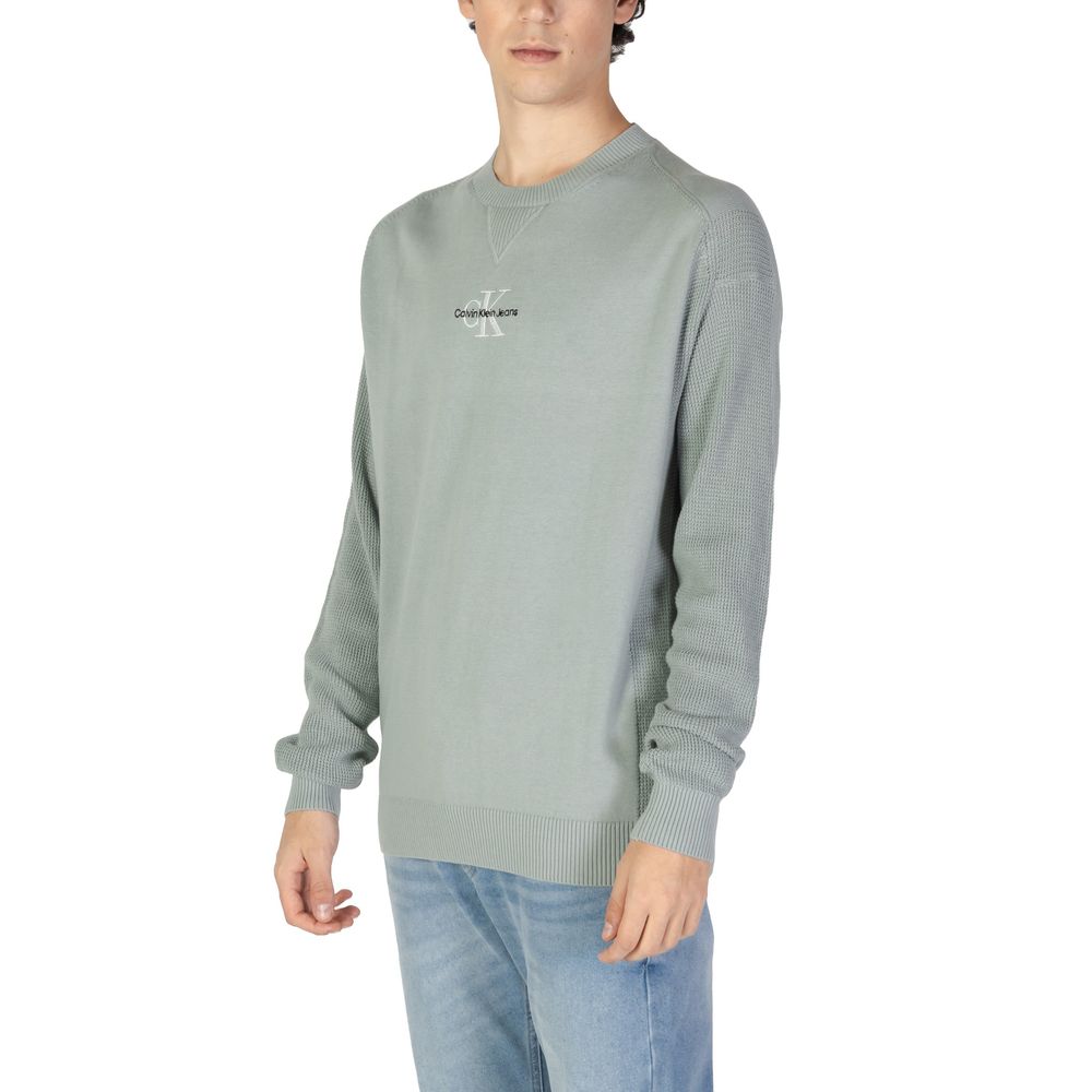 Green Cotton SweaterThe Calvin Klein Jeans MONOLOGO J30J325671 men’s sweater offers a contemporary and refined style, perfect for any casual or informal occasion. Made from 100% transitional in-conversion cotton, this garment ensures comfort, breathabilit
