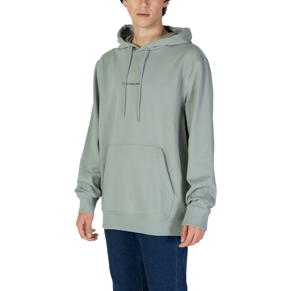 Green Cotton HoodieDiscover the Calvin Klein Jeans GRID MONOGRAM hoodie for men, an essential piece for your wardrobe. Made from 100% cotton, this hoodie offers exceptional comfort and a soft feel against the skin. The modern design is enhanced by the Cal