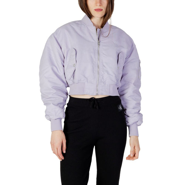 Purple Polyamide Jackets & CoatThe Calvin Klein Jeans LW BOMBER J20J221378 women’s bomber jacket is an iconic piece that combines contemporary style with practicality. Made from 100% polyamide, this jacket features a cropped cut and a slightly oversized f