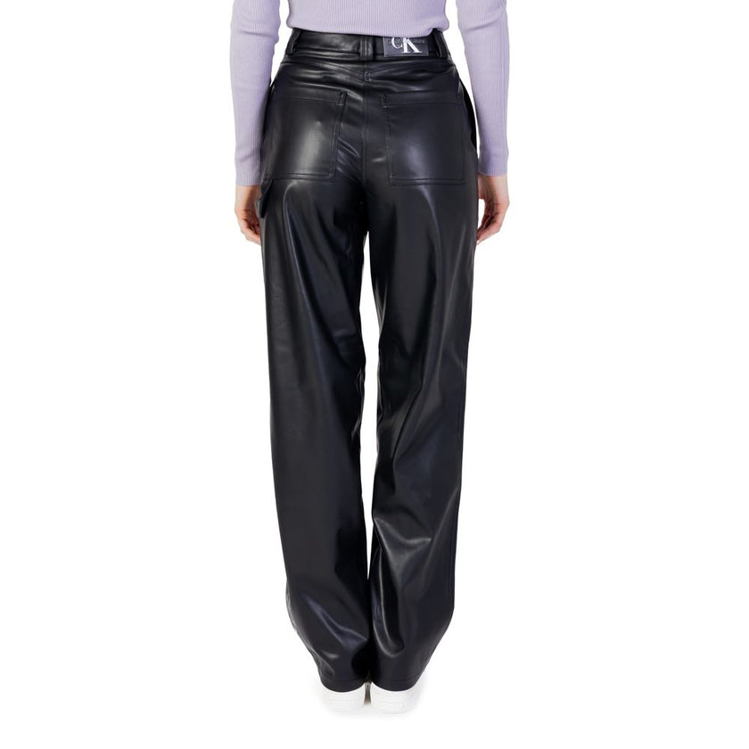 Black Recycled Polyester PantThe Calvin Klein Jeans J20J221385 – FAUX LEATHER HIGH regular-fit women’s trousers offer a contemporary and refined style choice. Crafted from high-quality faux leather, these trousers feature a straight leg and a high-waisted