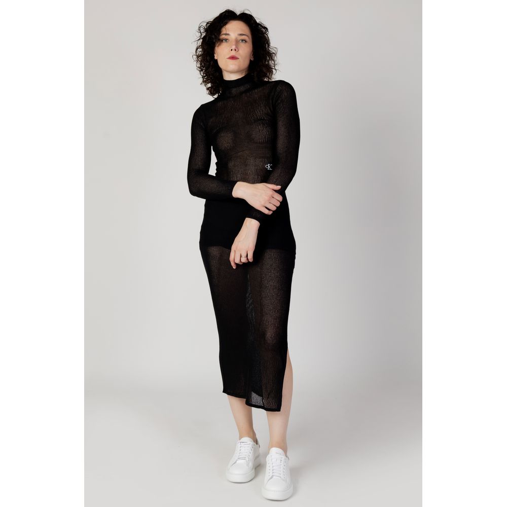 Black Marabou Long DressThe Calvin Klein Jeans SHEER TIGHT SWEATER J20J222275 long dress embodies the perfect blend of contemporary style and minimalist sophistication. Crafted from a blend of 63% acrylic and 37% polyamide, this dress stands out for its l