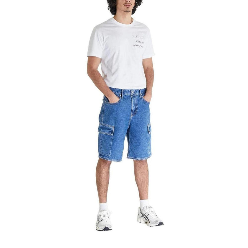 Blue Cotton Bermuda ShortsThe Calvin Klein Jeans men’s bermuda shorts J30J324877 90’S LOOSE are the ideal choice for those seeking a casual and contemporary look. Made from 80% cotton and 20% recycled cotton, they offer both comfort and sustainability. Th