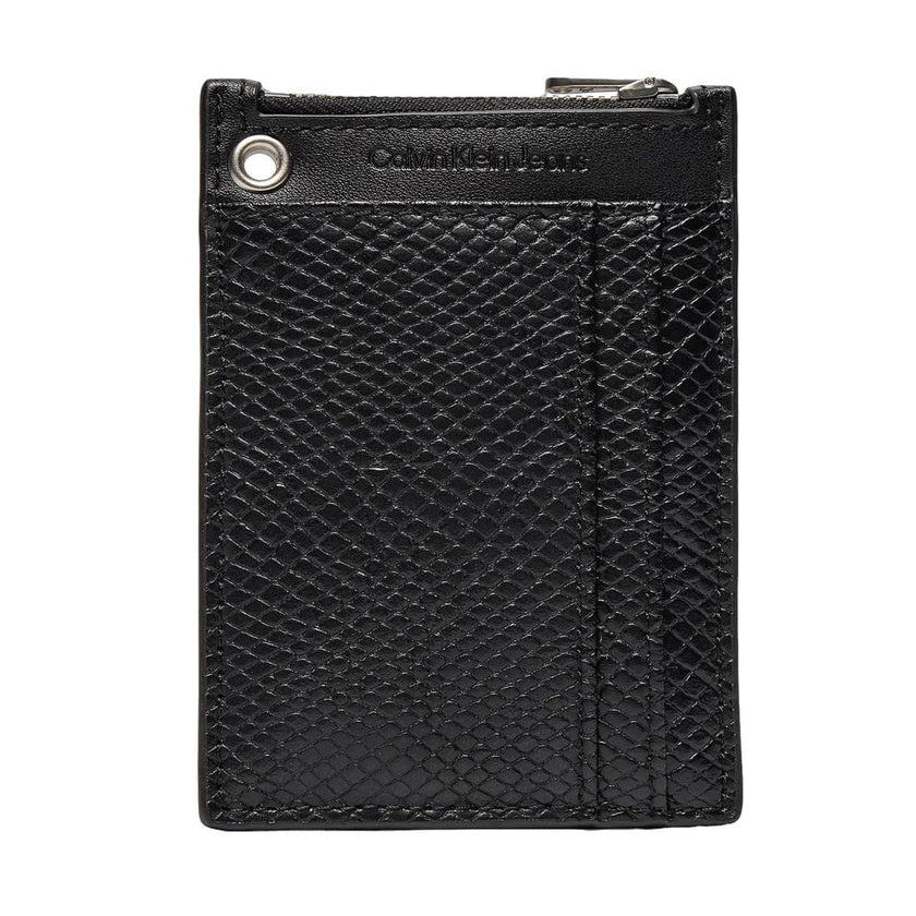 Black Polyethylene CardholderThe Calvin Klein Jeans K60K611562 women’s card holder wallet stands out for its modern, compact design, ideal for those seeking practicality and elegance. Made from high-quality materialsâ72% polyurethane and 28% recycled po
