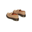 Beige Leather Platform PumpsThe Dr. Martens Adrian Virginia 31245439 women’s loafers combine classic elegance with a modern edge. Crafted entirely from premium leather, these shoes feature a smooth upper and meticulous artisanal detailing. The front is ad