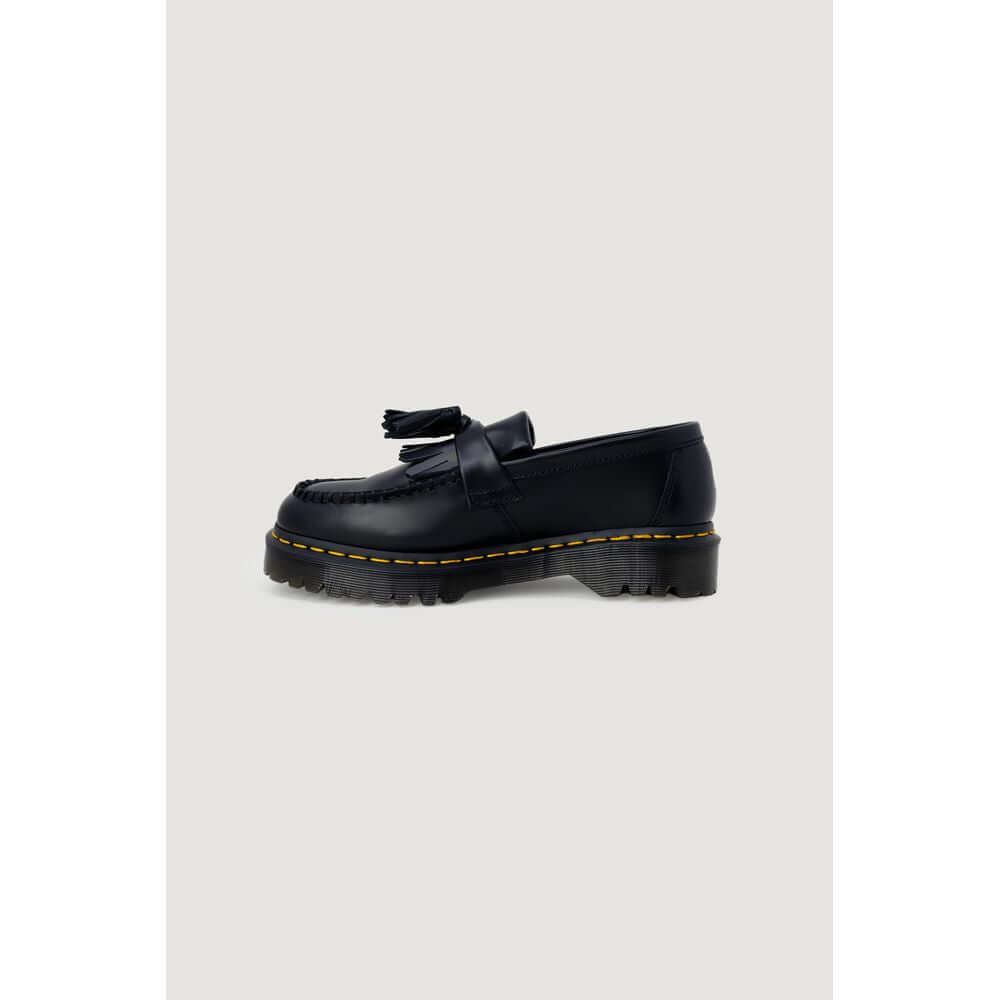 Black Leather Lace-Up BootsThe Dr. Martens Adrian Bex Smooth 26957001 women’s lace-up shoes are an icon of style and attitude. Crafted entirely from high-quality leather, these loafers feature a classic silhouette enhanced by distinctive details such as t