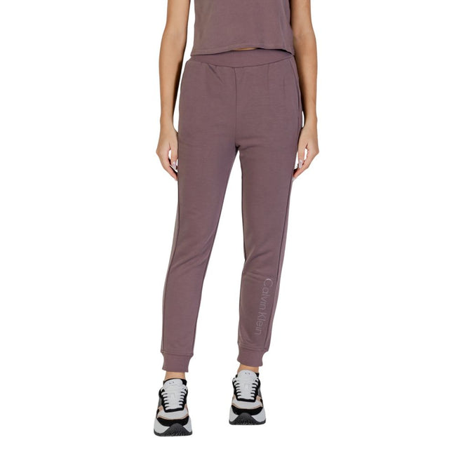 Purple Recycled Polyester Joggers (Workout Pants)The Calvin Klein Sport PW – JOGGER 00GWF4P601 women’s joggers are the perfect choice for those seeking comfort and style during their workouts. Made from 100% recycled polyester, these joggers not only prov