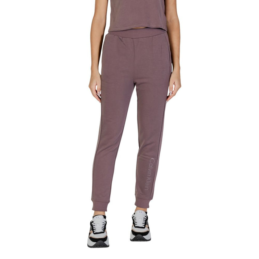 Purple Recycled Polyester Joggers (Workout Pants)The Calvin Klein Sport PW – JOGGER 00GWF4P601 women’s joggers are the perfect choice for those seeking comfort and style during their workouts. Made from 100% recycled polyester, these joggers not only prov