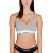 Gray Cotton BraDiscover the lightly lined bralette by Calvin Klein Underwear, an essential piece for your intimate wardrobe. Made with high-quality materials, this bralette consists of 53% cotton, 35% modal, and 12% elastane/lycra, ensuring a comfortable