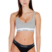 Gray Cotton BraDiscover the lightly lined bralette by Calvin Klein Underwear, an essential piece for your intimate wardrobe. Made with high-quality materials, this bralette consists of 53% cotton, 35% modal, and 12% elastane/lycra, ensuring a comfortable