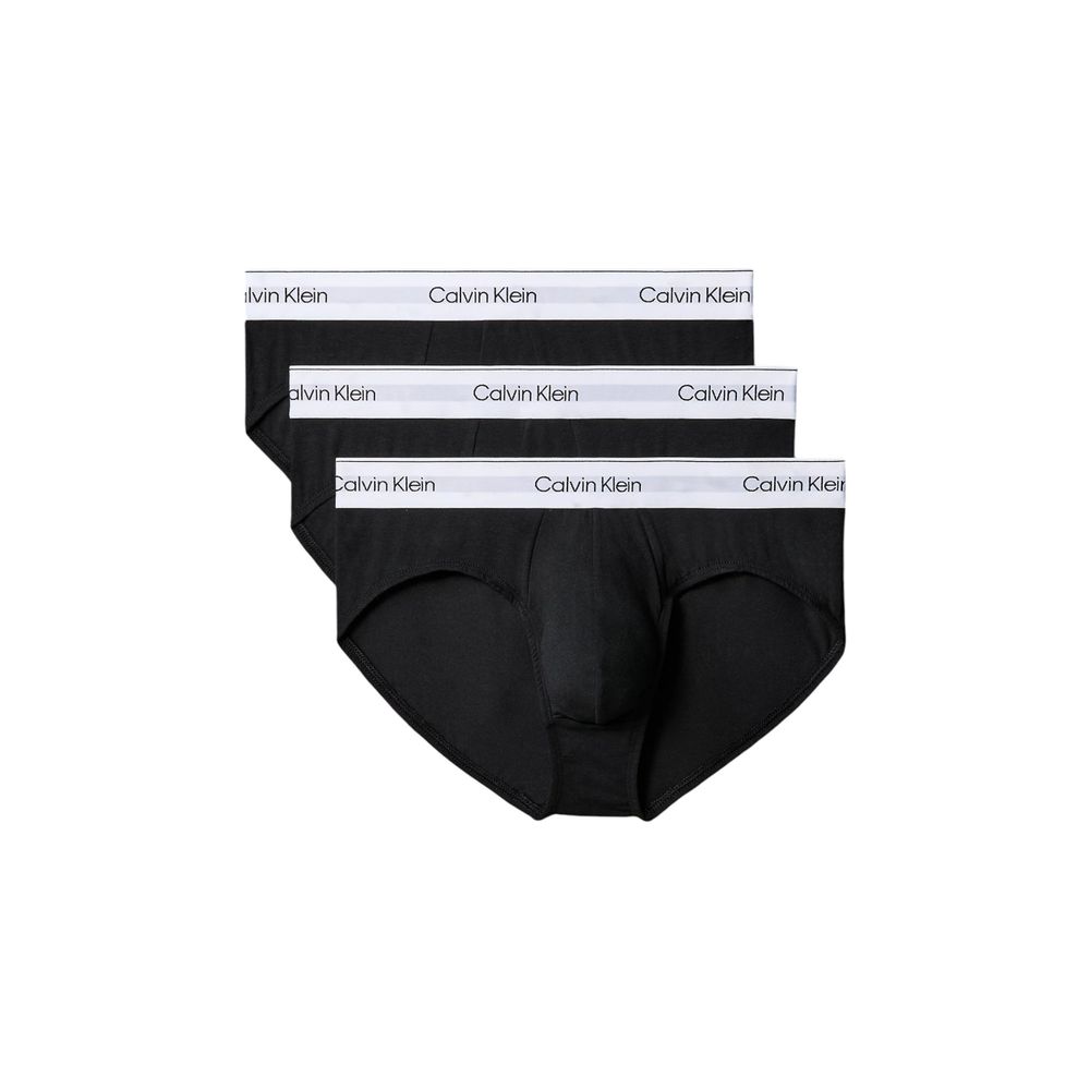 Black Cotton BriefsDiscover the timeless comfort and style of the Calvin Klein Underwear HIP BRIEF men’s briefs in a pack of 3. Made from high-quality materials, featuring 95% cotton and 5% elastane/lycra, these briefs provide a perfect fit and a soft fee