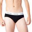 Black Cotton BriefsDiscover the comfort and timeless style of the Calvin Klein Underwear 3 Hip Brief U2661G men’s briefs. Made from a blend of 95% cotton and 5% stretch, these briefs provide a perfect fit and a soft feel against the skin. The elastic wais
