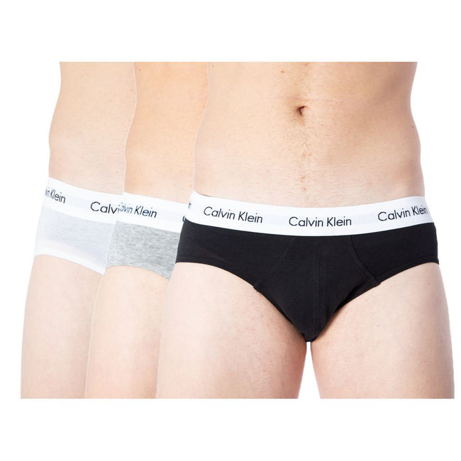 Gray Cotton BriefsDiscover the comfort and timeless style of the Calvin Klein Underwear 3 Hip Brief U2661G men’s briefs. Made from a blend of 95% cotton and 5% stretch, these briefs provide a perfect fit and a soft feel against the skin. The elastic waist