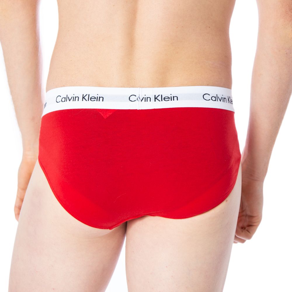 Red Cotton BriefsDiscover the comfort and timeless style of the Calvin Klein Underwear 3 Hip Brief U2661G men’s briefs. Made from a blend of 95% cotton and 5% stretch, these briefs provide a perfect fit and a soft feel against the skin. The elastic waistb