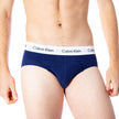 Red Cotton BriefsDiscover the comfort and timeless style of the Calvin Klein Underwear 3 Hip Brief U2661G men’s briefs. Made from a blend of 95% cotton and 5% stretch, these briefs provide a perfect fit and a soft feel against the skin. The elastic waistb