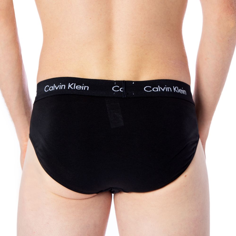 Blue Cotton BriefsDiscover the comfort and timeless style of the Calvin Klein Underwear 3 Hip Brief U2661G men’s briefs. Made from a blend of 95% cotton and 5% stretch, these briefs provide a perfect fit and a soft feel against the skin. The elastic waist