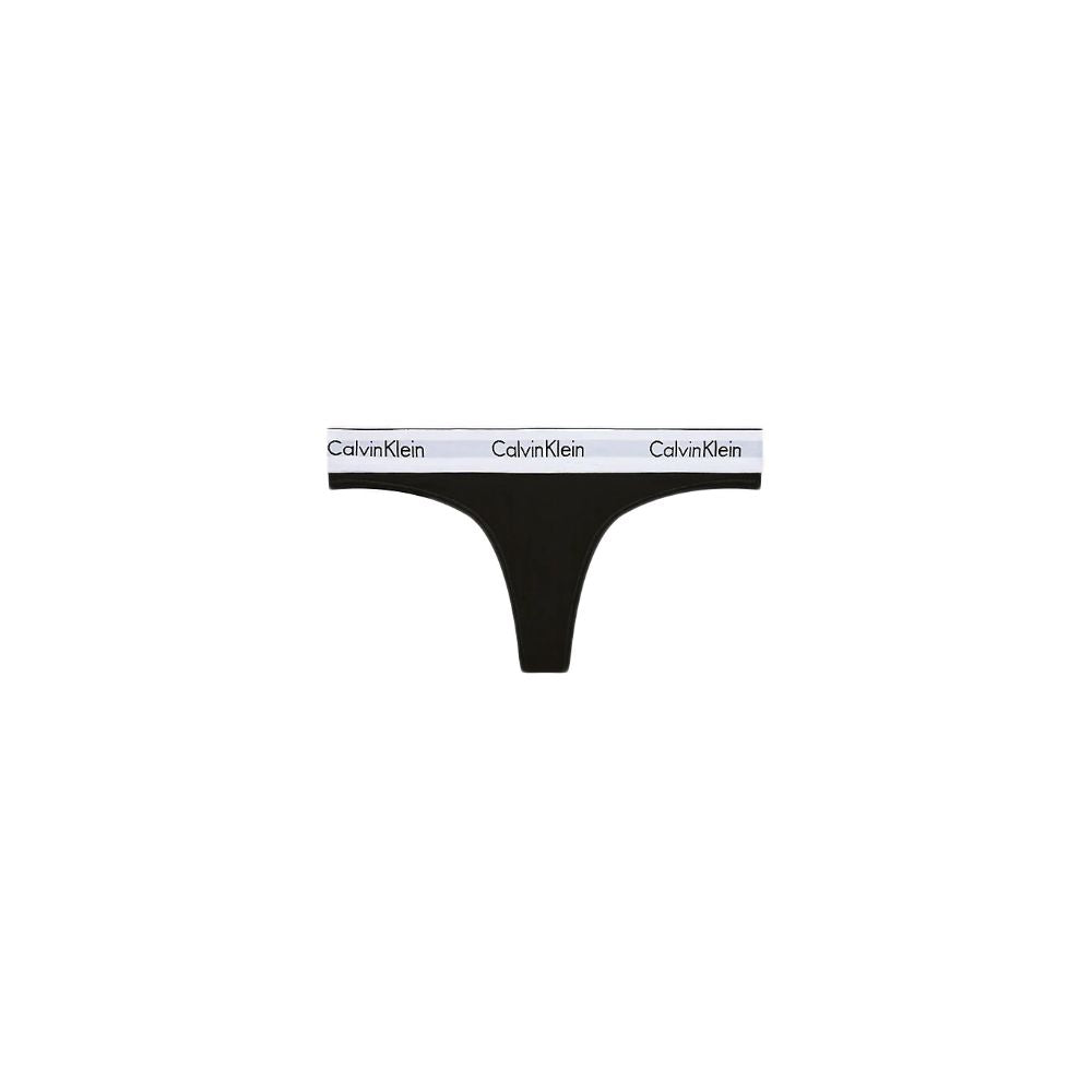 Black Cotton PantieDiscover timeless comfort and style with the Calvin Klein Underwear THONG F3786E. Made from a high-quality blend of 53% cotton, 35% Modal, and 12% elastane, this thong is designed to provide a perfect fit and a soft feel against the ski