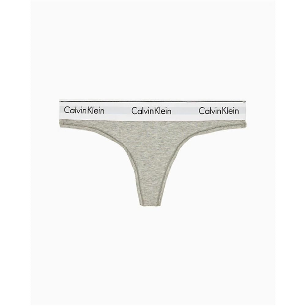 Gray Cotton PantieDiscover timeless comfort and style with the Calvin Klein Underwear THONG F3786E. Made from a high-quality blend of 53% cotton, 35% Modal, and 12% elastane, this thong is designed to provide a perfect fit and a soft feel against the skin