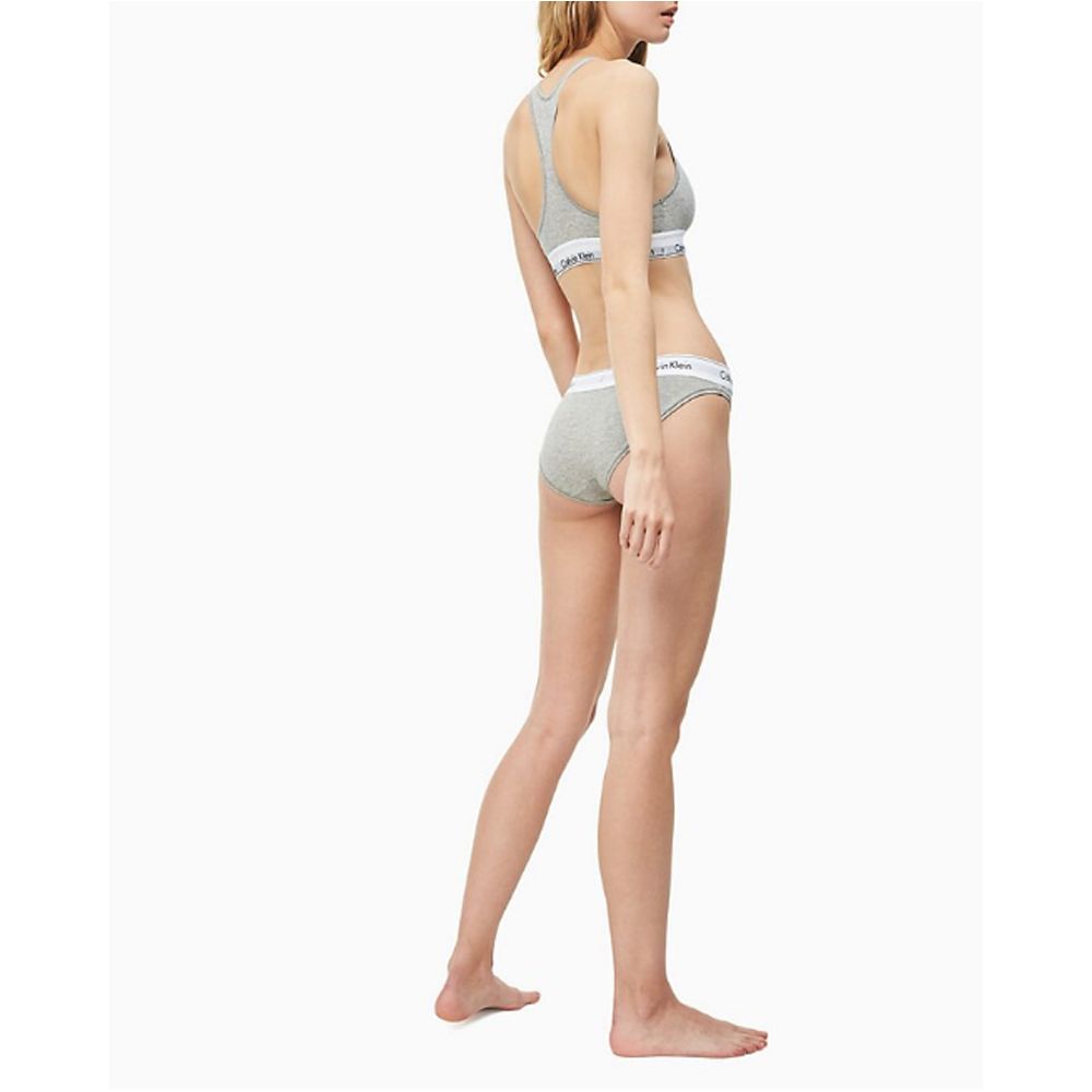 Gray Cotton PantieDiscover the ultimate comfort and style with the Calvin Klein Underwear BIKINI F3787E women’s briefs and thong. Made from a high-quality blend of 53% cotton, 35% modal, and 12% elastane, these pieces offer a soft and snug fit. The minima