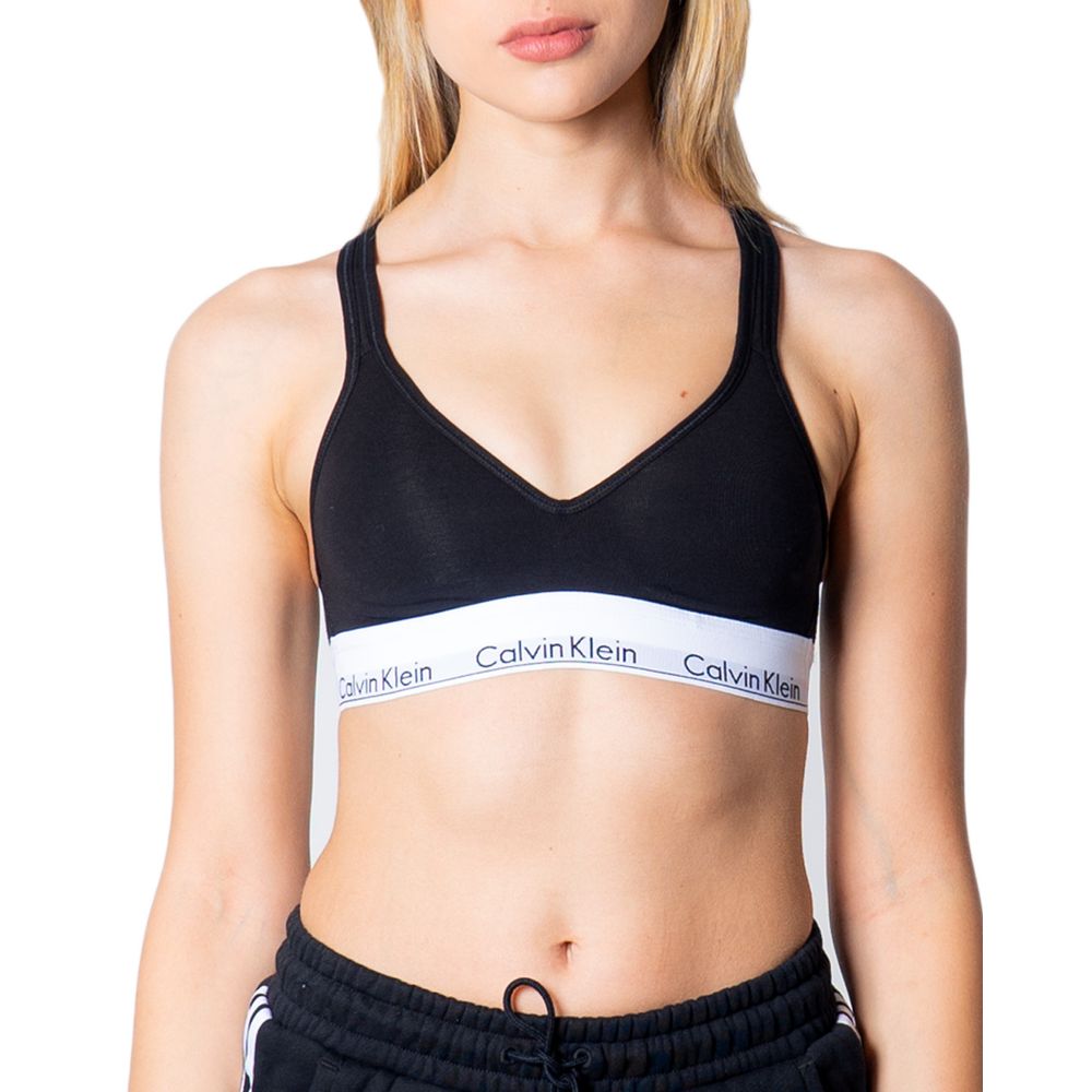 Black Polyester BraDiscover the Lift bralette by Calvin Klein Underwear, an essential piece for your intimate wardrobe. Made from 100% polyester, this bra is designed to provide comfort and support throughout the day. Its bralette shape is perfect for a c