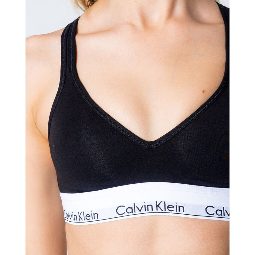 Black Polyester BraDiscover the Lift bralette by Calvin Klein Underwear, an essential piece for your intimate wardrobe. Made from 100% polyester, this bra is designed to provide comfort and support throughout the day. Its bralette shape is perfect for a c