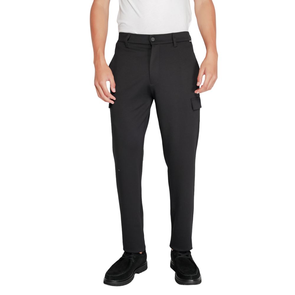 Black Recycled Polyester Joggers (Workout Pants)Discover the Calvin Klein Comfort Knit Tapered sports pants for men, model K10K113487, crafted from an innovative blend of sustainable materials. With 75% recycled polyester and 22% sustainable viscose, thes