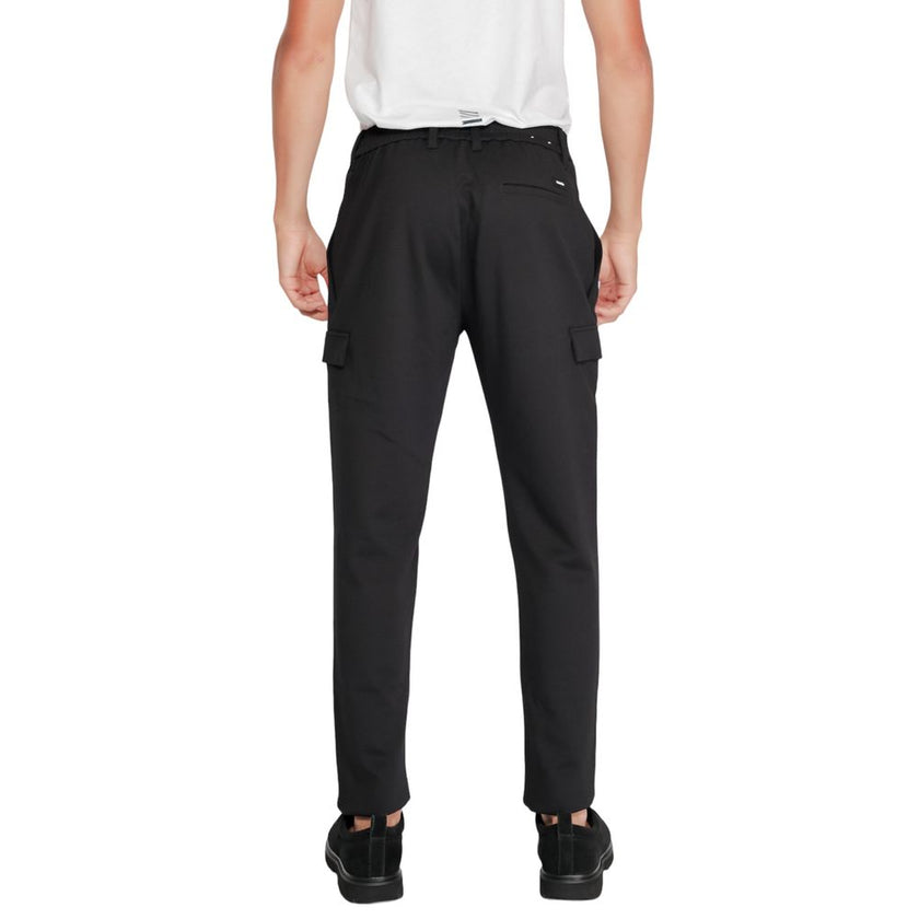 Black Recycled Polyester Joggers (Workout Pants)Discover the Calvin Klein Comfort Knit Tapered sports pants for men, model K10K113487, crafted from an innovative blend of sustainable materials. With 75% recycled polyester and 22% sustainable viscose, thes