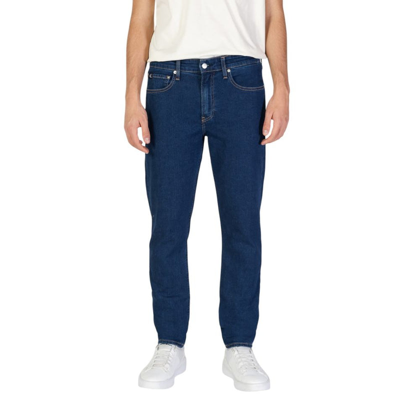 Blue Cotton Slim Fit JeansThe Calvin Klein Jeans TAPER J30J325888 men’s tapered jeans offer a perfect blend of contemporary style and comfort. Crafted from a sustainable fabric mix featuring 70% cotton, 20% recycled cotton, 8% polyester, and 2% elastane/l