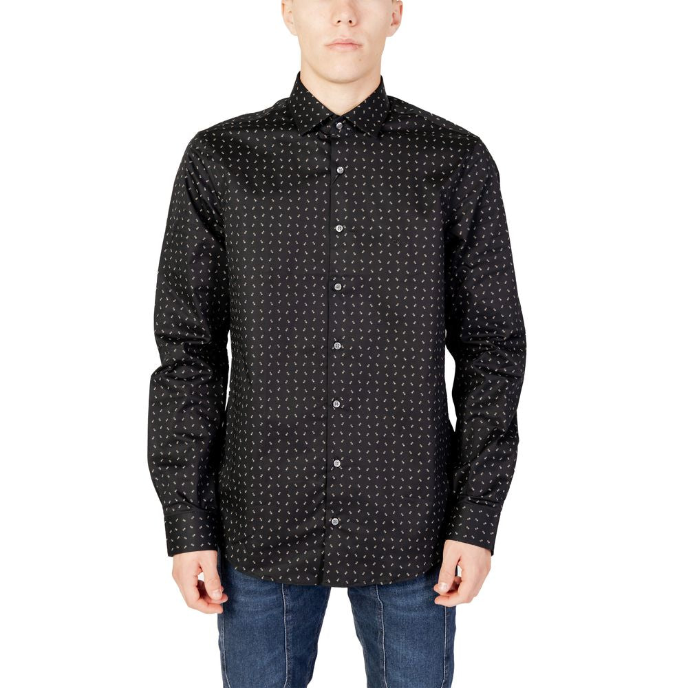 Black Cotton ShirtThe Calvin Klein TWILL 2 COLOR PRINT K10K112104 men’s shirt embodies contemporary style and sophistication. Crafted from high-quality twill fabric, this long-sleeved shirt ensures a comfortable fit thanks to its blend of cotton (96%) and