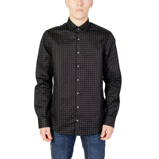 Black Cotton ShirtThe Calvin Klein TWILL 2 COLOR PRINT K10K112104 men’s shirt embodies contemporary style and sophistication. Crafted from high-quality twill fabric, this long-sleeved shirt ensures a comfortable fit thanks to its blend of cotton (96%) and