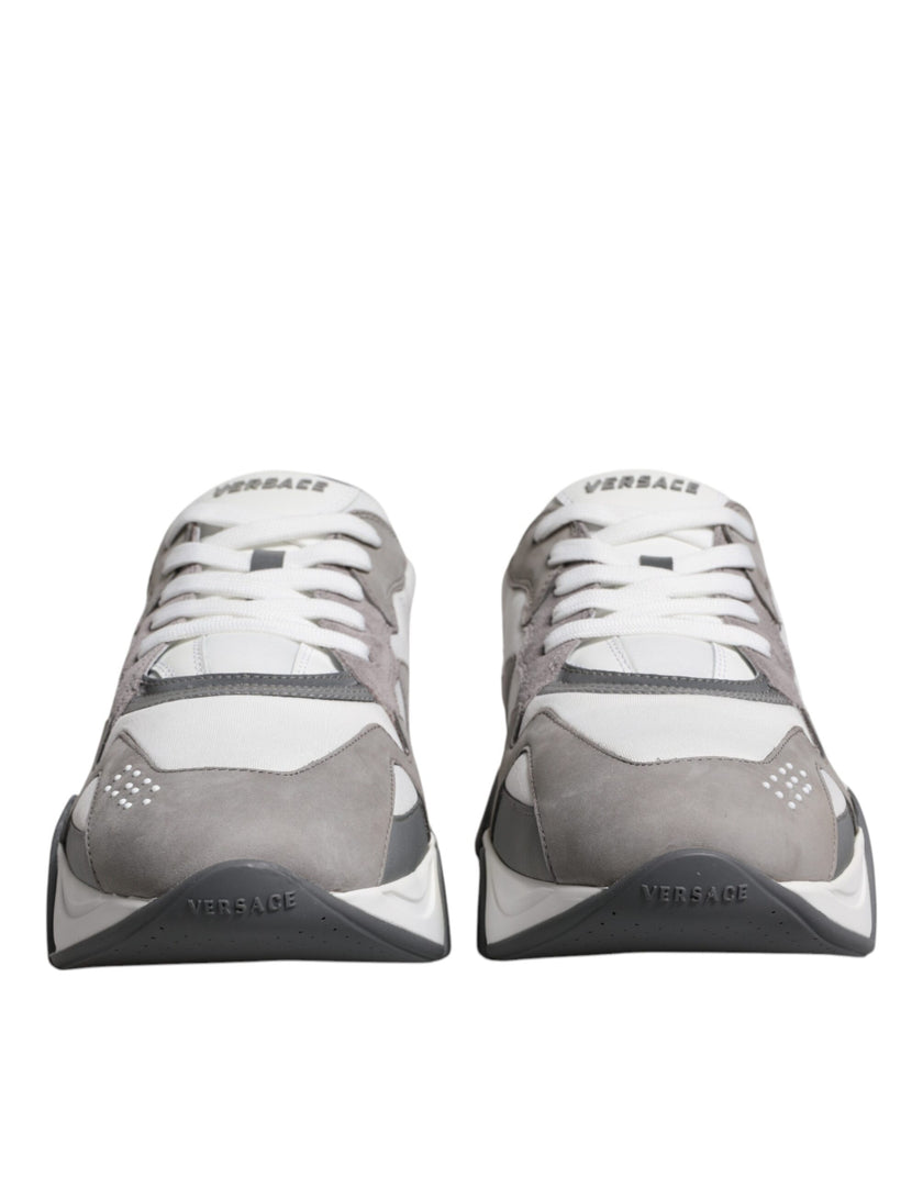 Grey Leather Neoprene Chunky Low Top Squalo Sneakers ShoesVERSACE Gorgeous brand new with tags, 100% Authentic VERSACE Squalo gray leather mesh chunky sneakers. Model: Low-top sneakers Colour: Grey Material: 60% CO 40% VL Rubber sole Lace up closure Logo