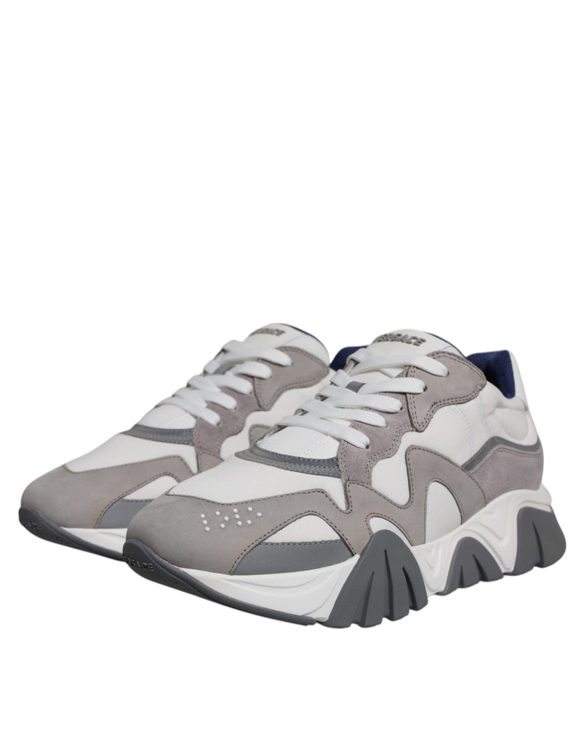 Grey Leather Neoprene Chunky Low Top Squalo Sneakers ShoesVERSACE Gorgeous brand new with tags, 100% Authentic VERSACE Squalo gray leather mesh chunky sneakers. Model: Low-top sneakers Colour: Grey Material: 60% CO 40% VL Rubber sole Lace up closure Logo