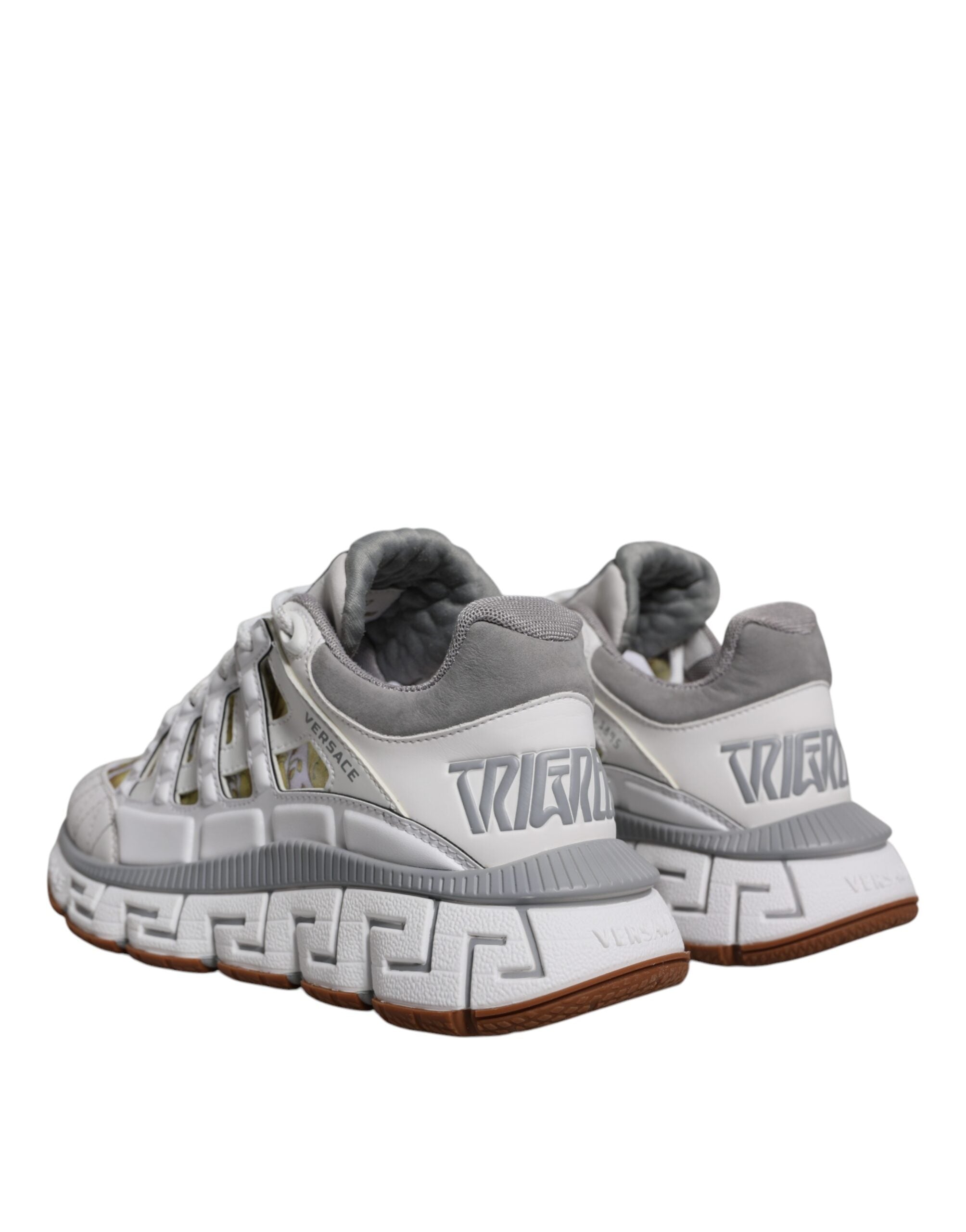 White Trigreca Barocco Print Low Top Sneakers ShoesVERSACE Gorgeous brand new with tags, 100% Authentic VERSACE Barocco Trigreca sneakers. Harnessing their signature aesthetic, these timeless shoes feature a distinctive three-dimensional Greca pattern. Mo