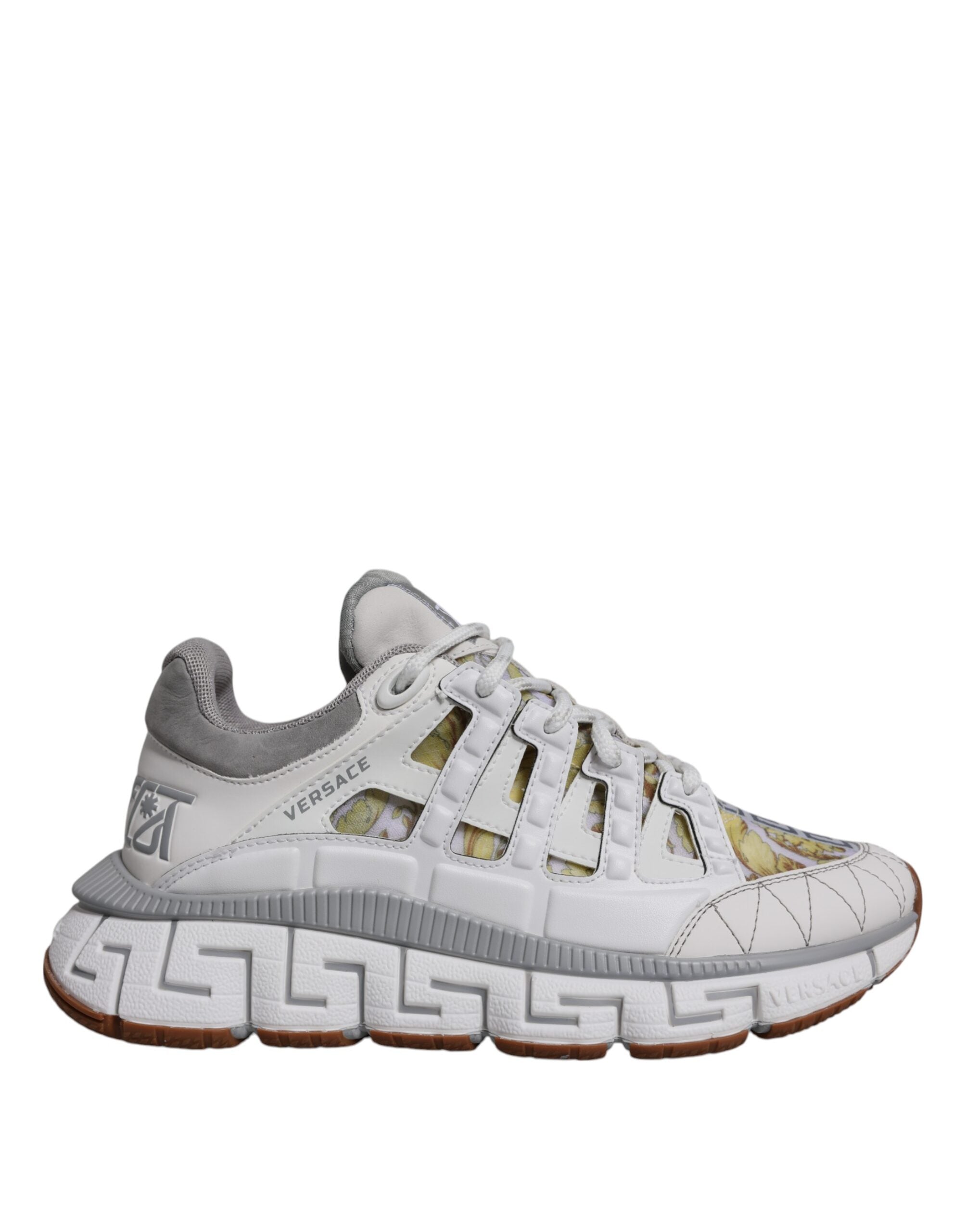 White Trigreca Barocco Print Low Top Sneakers ShoesVERSACE Gorgeous brand new with tags, 100% Authentic VERSACE Barocco Trigreca sneakers. Harnessing their signature aesthetic, these timeless shoes feature a distinctive three-dimensional Greca pattern. Mo