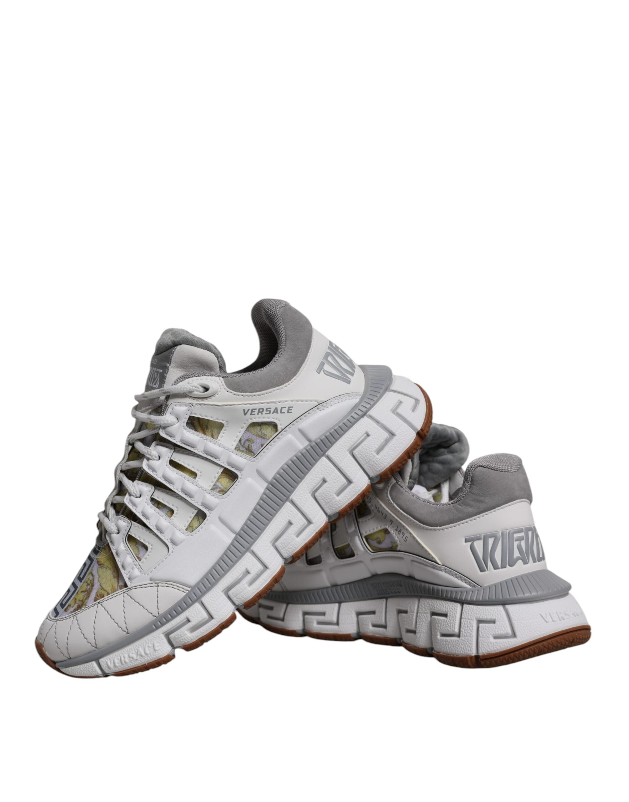 White Trigreca Barocco Print Low Top Sneakers ShoesVERSACE Gorgeous brand new with tags, 100% Authentic VERSACE Barocco Trigreca sneakers. Harnessing their signature aesthetic, these timeless shoes feature a distinctive three-dimensional Greca pattern. Mo