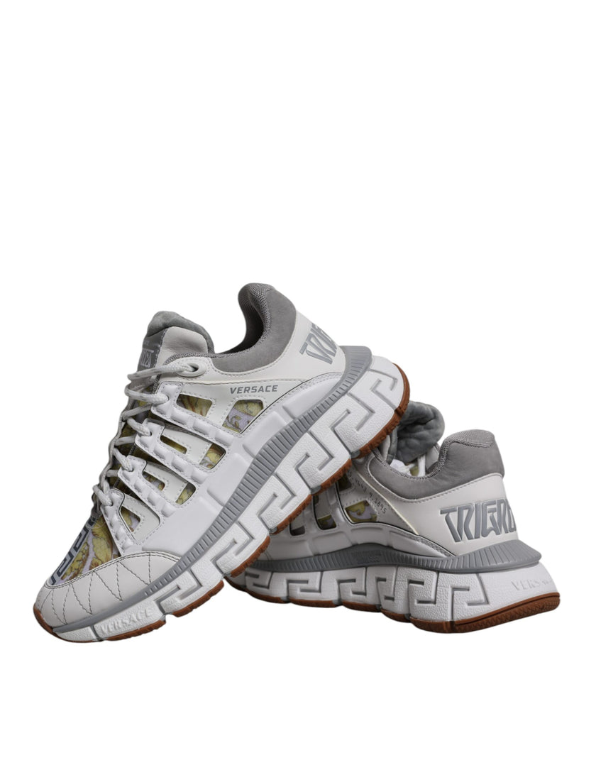 White Trigreca Barocco Print Low Top Sneakers ShoesVERSACE Gorgeous brand new with tags, 100% Authentic VERSACE Barocco Trigreca sneakers. Harnessing their signature aesthetic, these timeless shoes feature a distinctive three-dimensional Greca pattern. Mo