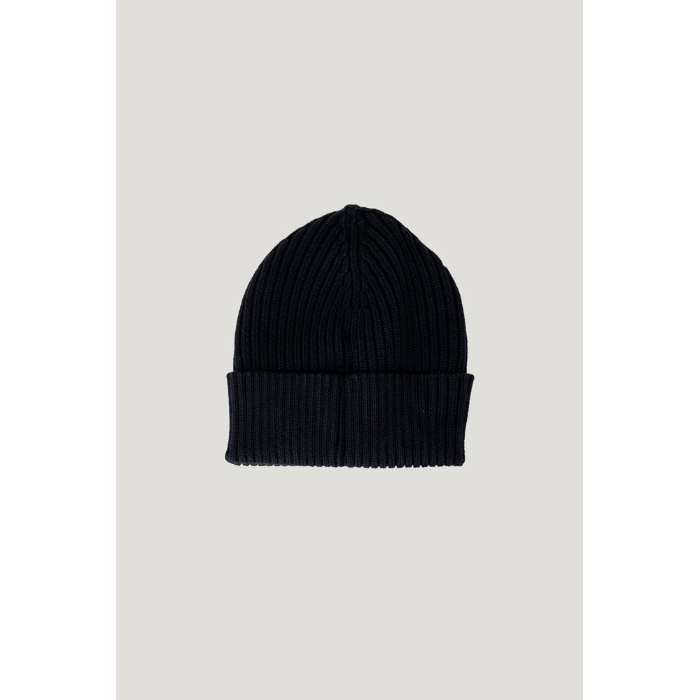 Black Wool Cap (Baseball Hat)Discover the Calvin Klein Jeans K60K611030 – MONOGRAM women’s beanie, a stylish and versatile accessory to complete your look. Made from a blend of 50% wool and 50% acrylic, this beanie provides warmth and comfort, making it p