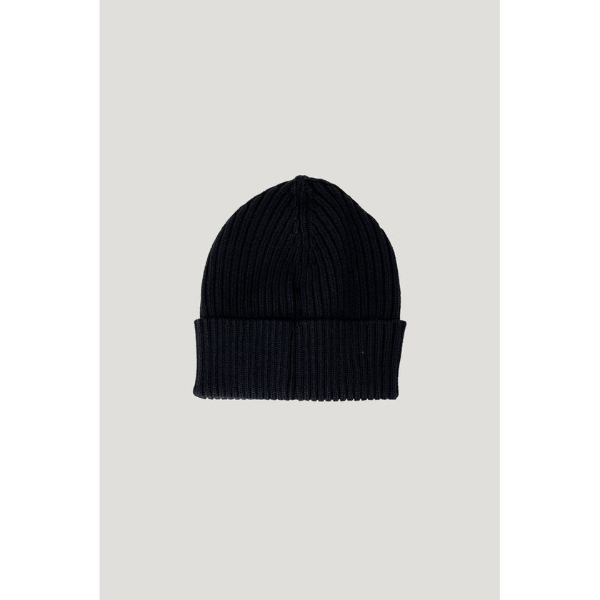 Black Wool Cap (Baseball Hat)Discover the Calvin Klein Jeans K60K611030 – MONOGRAM women’s beanie, a stylish and versatile accessory to complete your look. Made from a blend of 50% wool and 50% acrylic, this beanie provides warmth and comfort, making it p