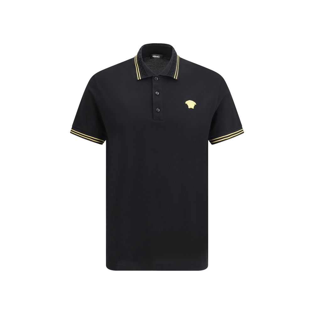 Black Cotton Polo ShirtCotton Polo Shirt by Versace, classic ribbed collar, tone-on-tone front buttons, iconic brand logo patch applied on front, regular fit. Season: AW25 Composition: 100% Cotton MADE IN TUNISIABlack Cotton Polo Shirt${tagsVersaceAulae B